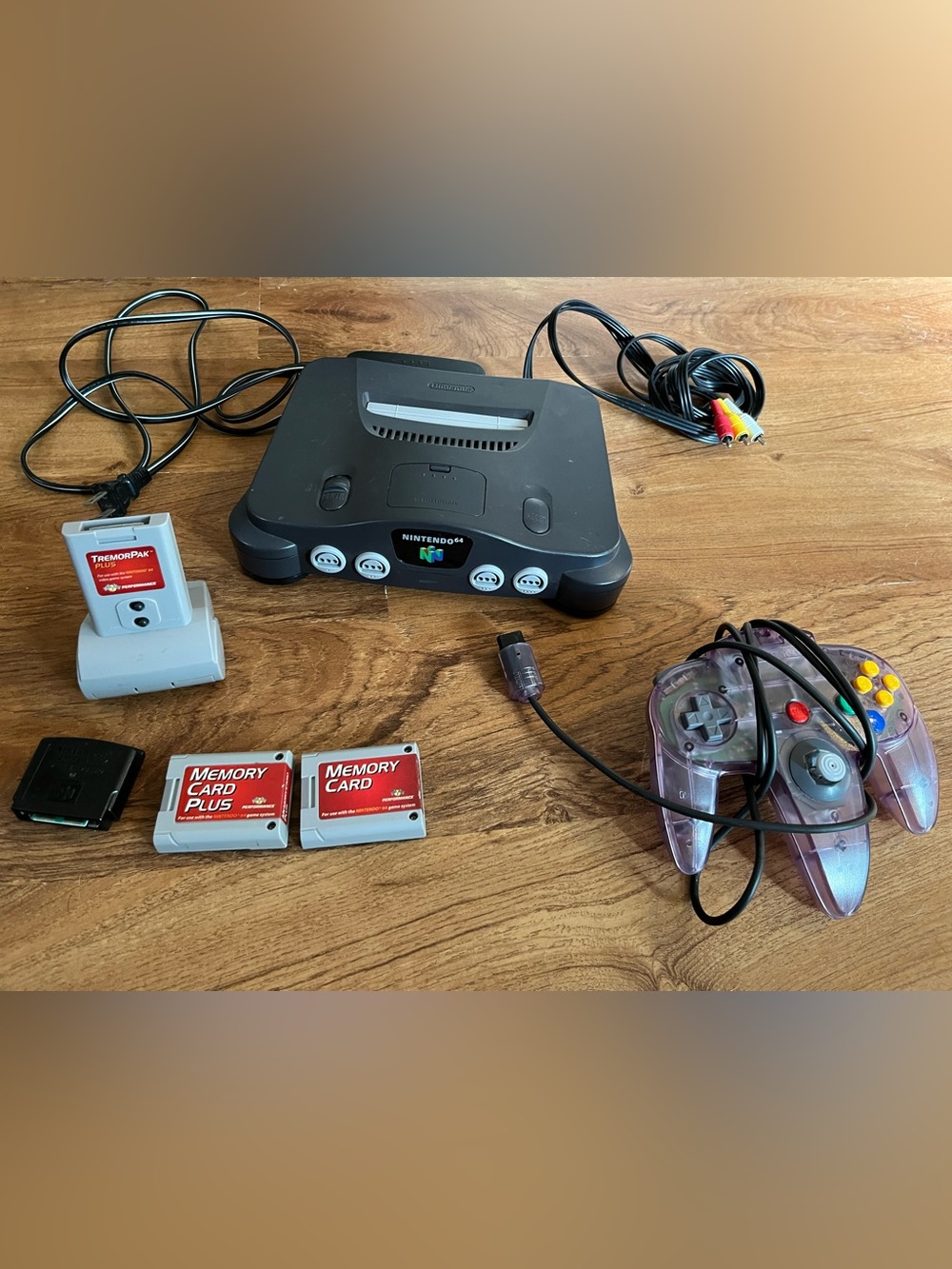 Nintendo 64 Console with cords and memory cards jumper pak tremorpak n64
